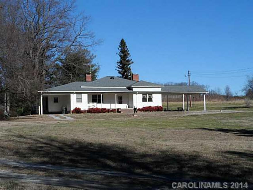 Large farm with seperate living quarters ideal for mother in law suite, or could be rented for extra income.Home water comes from spring on property.