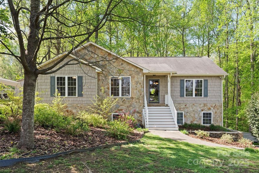 Welcome to this meticulously maintained & thoughtfully updated ranch, nestled in a peaceful cul-de-sac setting! This charming home features 3 spacious bedrooms & 2 full baths on the main level, highlighted by an open floor plan that seamlessly connects the living spaces. The primary suite is a true retreat, offering an en-suite bath & a walk-in closet. Enjoy year-round comfort in the heated & air-conditioned all-seasons room, where you'll take in picturesque views of the beautifully landscaped backyard. The fully finished basement is a standout, offering a its own kitchen, living room, full bath, & flex space. Step right out to the nearly 400 sqft covered patio — perfect for entertaining or relaxing in your serene outdoor oasis. The backyard is an entertainer’s dream, featuring a cozy fire pit area and a handy shed for all your gardening tools or mower. With its blend of functionality, charm, & versatility, this home is ready to welcome its next owner!