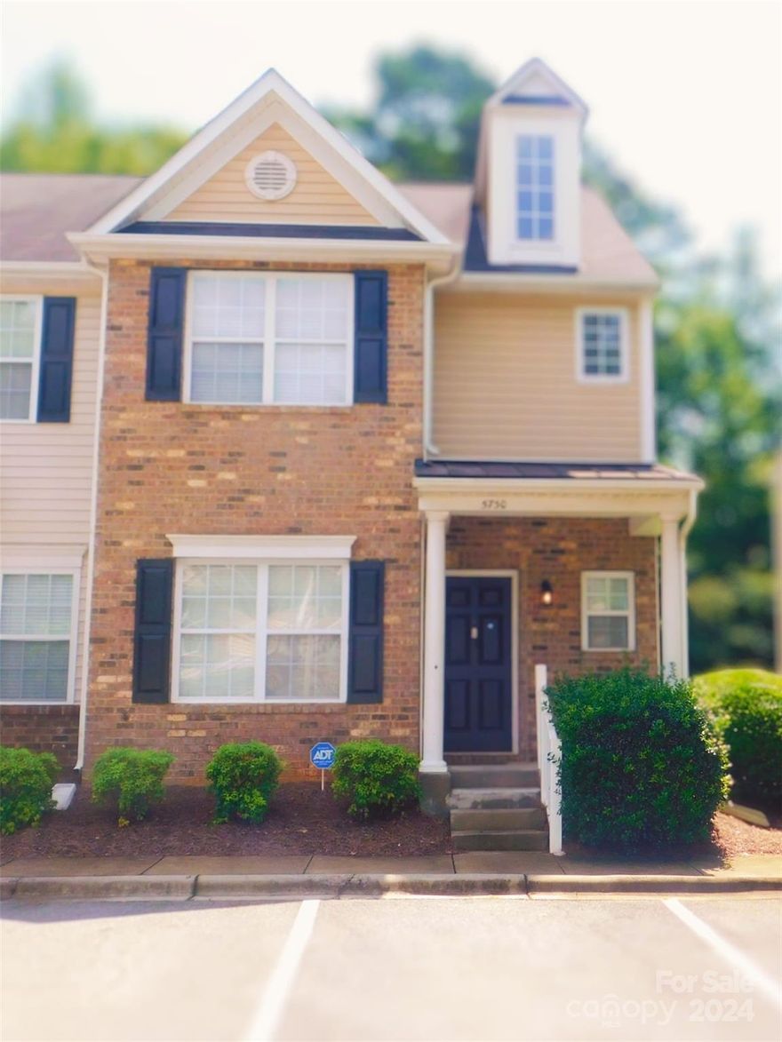 Welcome Home! 5730 Bent Creek Cir. is a beautiful end-unit townhome in the Bent Creek subdivision, originally built in 2007. The unit features the primary owner's suite located on the main level with two additional large bedrooms and a full bathroom on the upper level. The unit features an open floorplan with a fireplace, bar seating, a dining area. The backyard is fenced and the home backs up to wooded tree area. The owner has replaced the floor with LVP in 2021, a full HVAC replacement in 2021, and quartz countertops. All appliances remain including refrigerator, washer and dryer. 2 parking spaces in front of home along with 2 visitor parking spaces. The mounted TVs do not convey. Easy commute to uptown and 485 and convenient to all Matthews and Mint Hill shopping/restaurants. Water/Sewer included in the monthly HOA dues. There is a pending special assessment for all residents in the amount of $5,000 to replace the roof which will be paid by the seller.