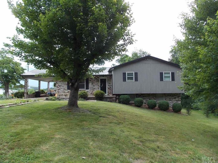 3BR. 1 1/2 Bath Split Level Home with open dining room and kitchen are w/ eat in breakfast bar. New flooring in kitchen and bath. Freshly painted. Full basement for lots of storage.  Large deck off the back for entertaining. Out building stays