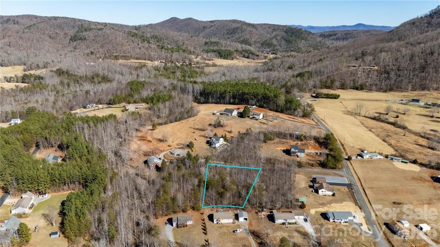 Located in the highly desirable Glenwood community of Marion, this beautiful parcel offers the perfect blend of natural beauty, usability, and location. The land features a gentle, build-friendly slope, ideal for a variety of home designs—from a mountain retreat to a full-time residence—while still allowing for elevated views and excellent drainage.

A major advantage is the availability of underground utilities, preserving the area’s clean sightlines and enhancing long-term value. The property’s terrain provides an easy build site without the heavy grading often required in mountain settings.

Glenwood is known for its peaceful, rural feel while remaining just minutes from downtown Marion, local shops, dining, and everyday conveniences. Outdoor enthusiasts will appreciate close proximity to Pisgah National Forest, Lake James, and countless hiking, fishing, and biking opportunities throughout McDowell County. With quick access to I-40, Asheville and the Blue Ridge Parkway are an easy drive away.

Whether you’re looking to build now or invest in a sought-after mountain location, this Glenwood property offers the rare combination of location, gentle topography, and modern infrastructure in one of Marion’s most desirable areas.