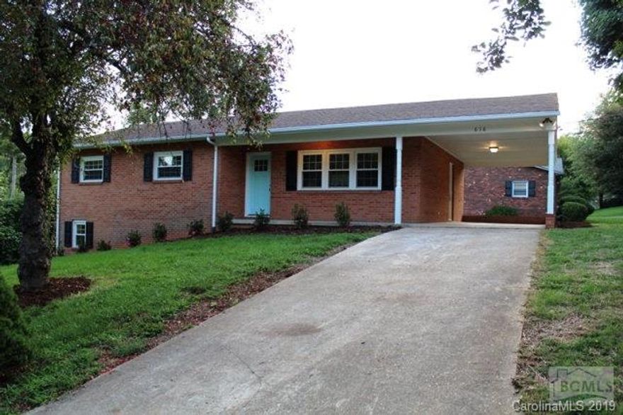 Completely renovated 4BR/2BA brick ranch in excellent neighborhood in downtown Hudson on corner lot. Large master suite w/ WIC, spacious tiled shower and double-sink vanity. Beautiful main bath also has double-sink vanity and new tub w/ tiled surround. Open-concept kitchen/dining/living room has lots of space for entertaining. Beautiful kitchen w/ new cabinets, granite counters and stainless appliances. Large eat-in island provides lots of prep space. Great den and large laundry room. Lots of storage throughout. New windows, new heat pump, new flooring, fresh paint, new fixtures. A beautiful home. Agent has interest and is related to seller. Architectural roof estimated 10 years old.