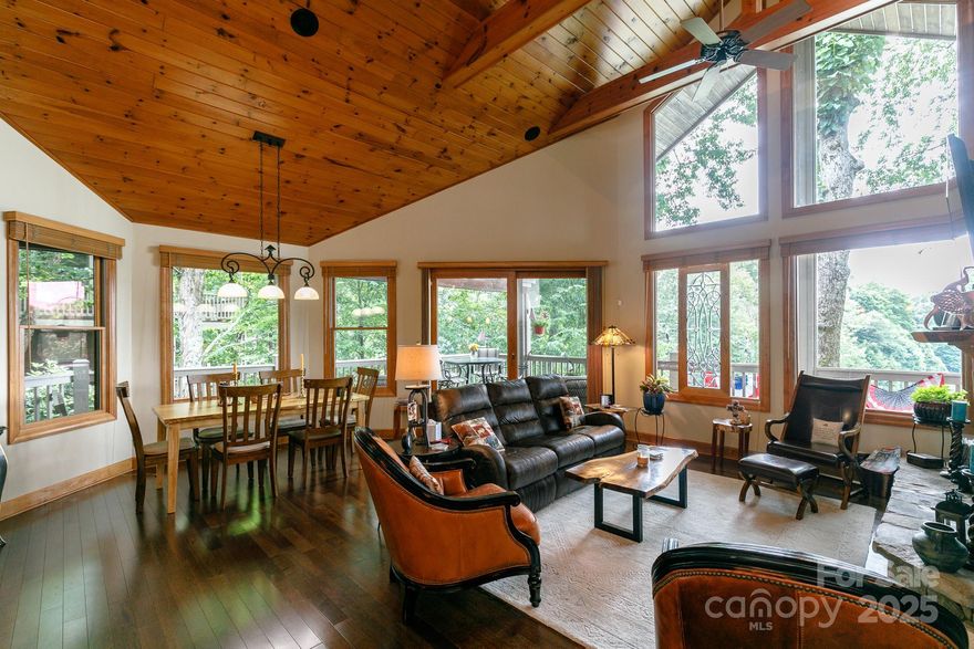 Very tastefully and beautifully furnished, updated MOUNTAIN AIR home with year-round mountain views. There are many newer features in this exceptional home. Light flows into the open main level with vaulted ceiling, stone FP, custom kitchen with granite, stainless appliances, spacious Primary BR with FP and en suite bath. Bathrooms updated with granite and tile. Office, 3 bedrooms and two baths on the lower level. Great wood accents throughout.  New roof in 2025. You won't want to change a thing! Large view decks with golf and mountain views. Garage is large enough for 2 cars and a golf cart. Beautiful views of number 18 green. 2022 ELECTRIC GOLF CART INCLUDED. Seller offers $15,000 towards Social Membership initiation fee at closing, which can be upgraded to Full Golf Membership. All property owners enjoy 6 parks, 6.5 miles of hiking trails, & private runway. Close to all club amenities, available with separate membership. Being sold mostly FURNISHED with some seller exceptions.