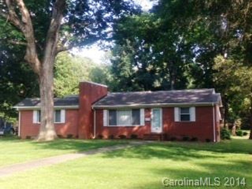 Price Reduced - Make an Offer! Great Investment Property! New Dishwasher! This home has been well cared for inside and out! Hardwoods under most of the carpeting. Large famliy room with fireplace.  Lots of storage closets. Wired workshop and utility building makes perfect private space. Beautiful trees, blueberry bushes and corner lot! All appliances convey.  See it today.