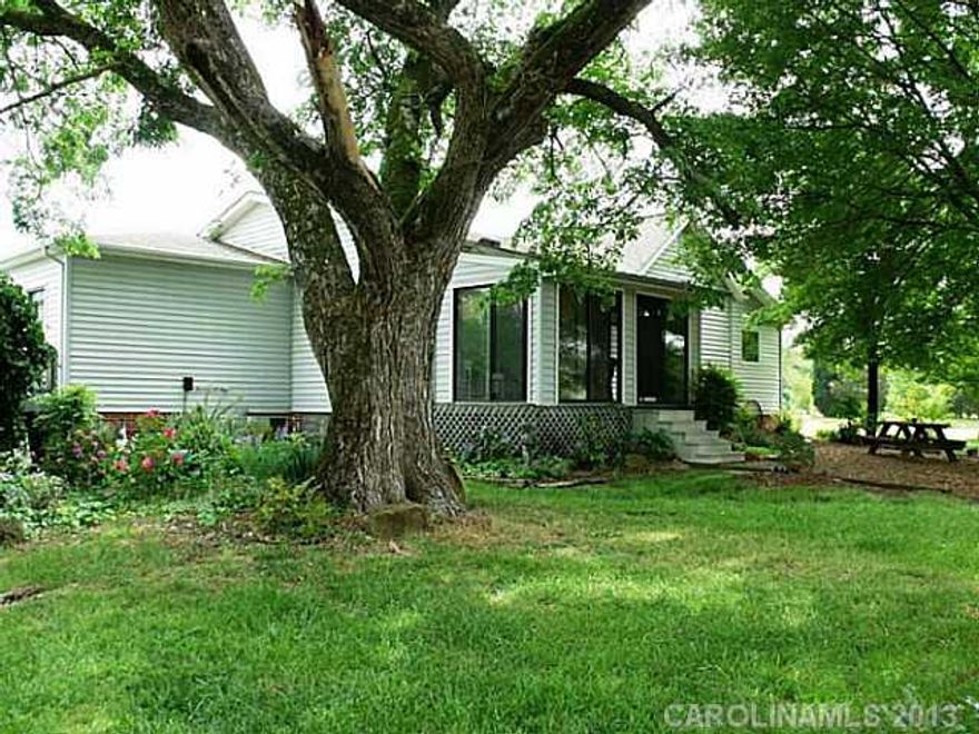 Whether a serious equestrian or just wanting privacy & space in a great location, this property is worth seeing.  Full equestrian operation w/up to 24 stalls,2 barns, 8 paddocks, indoor arena, outdoor arena & dressage area.  All great footings. Property wraps around Coddle Creek Reservoir w/water views. Current home is in good condition & quite cute. Will make a great guest/caretaker home.