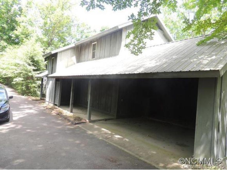 Fresh paint throughout home.  New carpet on stairs and in upstairs bedrooms.  Beautiful wood floors on first level.  Many closets with good storage.  Library built in basement with one wall of shelving plus gas fireplace.  Office nook in basement with 1/2 bath.  This is a unique residence.