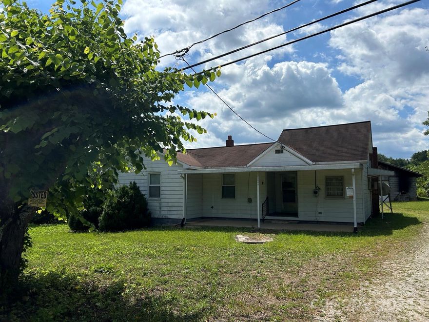 Buyer Agent to Verify schools and Square Footage.

THERE IS NO ELECTRICTY OR WATER ON IN THE HOME ! ! !
Great corner for future development, while it brings you income in now. builds are rented and home is rented plus billboard is rented. ready for purchase and enjoy the income now and be ready for future corner lot sale! ! !
YOU MUST BRING A FLASHLIGHT WITH YOU TO SHOW THIS PROPERTY ! ! !

This is a great property for someone to buy to live in and have a large workshop or garage. they could even fence in an area for livestock or a large garden area.

For all that this property has to offer the Price Is Right ! ! !