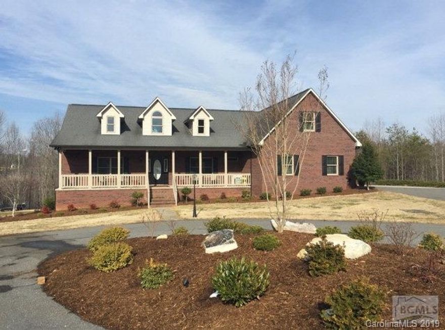 Custom built home on 10 acres. Beautiful long drive approach to this brick traditional convenient to Morganton and I-40. Home, with over 3800 square feet features two levels of living. Main level features full front porch, two story foyer, formal dining with columns, great room with fireplace, kitchen with granite tops/subway glass back splash, breakfast area, master suite with master bath plus walk-in closet, two bedrooms, bath, large laundry, bonus room over garage, large double garage, and back trex deck. Lower level features large family room with fireplace, study/possible 4th BR, large bath with walk-in shower, utility storage with garage door access, and patio which leads to custom fire pit area. Many custom elements completed by Interior Designer. Situated on 10 acres with privacy and nice landscaping. Large backyard is ideal for kids or pets. Lower level is perfect for in-law suite or older children. A Must See!