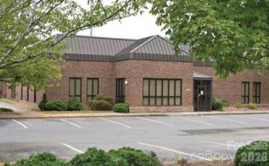 6920 E Marshville Blvd is a 3.12 acre, +/- 23,890 SF prime commercial opportunity with exceptional highway visibility in Marshville, NC and  surrounded by abundant retail and restaurants.  It has outstanding road frontage on highly traveled Hwy 74 with average daily traffic counts ranging from 18,000-30,000 vehicles per day, offering maximum exposure for your business.   The building contains 45% office space consisting of individual offices, a conference room, break room, restrooms, storage, and open office space on the first level.  The second level offers a training room and individual offices.  The office space is currently being renovated.  The warehouse space contains open storage space and has a 20' clear height.   There is one drive-in and one dock-high door and provides ample parking in the fenced back lot.  This property can be purchased or leased.