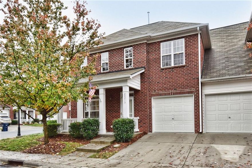 BRIGHT AND CHEERY BRICK, end unit steps from Jetton Village w/upscale supermarket, shops & restaurants. Absolutely move in ready. Beautiful hardwoods on main level. Gorgeous Kitchen w/granite & SS appliances flows into 2-story Great Room. MASTER ON MAIN plus 2nd MASTER SUITE and 2 additional bedrooms on 2nd floor!!! Open floor plan w/over 2600SF, walk in attic and loft. Attached 2 car garage. Private enclosed yard w/covered patio.  Community walking trails, pool & playground too.