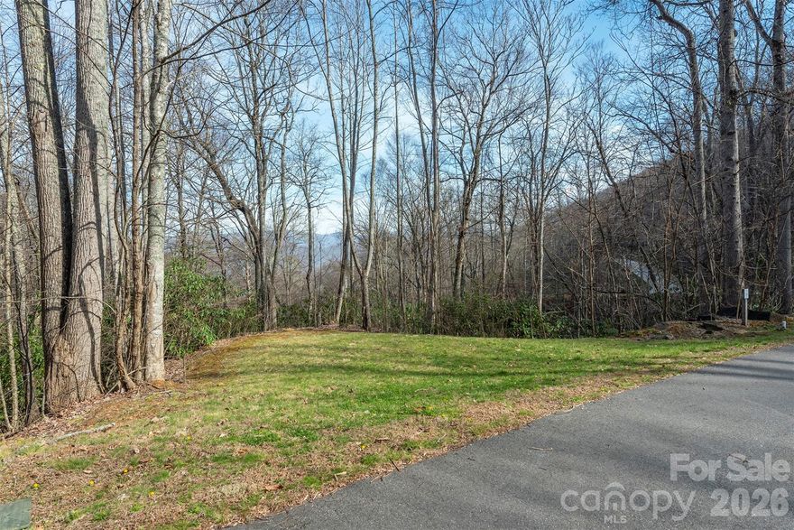 Welcome to 1279 Arborcrest Way in the beautiful gated community of High Hickory. This gently sloping homesite, just over 2 acres, offers the perfect setting to build your custom dream home. Enjoy amazing mountain views and the peaceful sounds of nearby creeks, creating a serene backdrop for everyday living.

Ownership in High Hickory provides paved road access to thoughtfully designed community amenities, including walking and hiking trails, a community garden, and an apiary—ideal for those seeking a connection with nature.

Conveniently located between Asheville and Black Mountain, this property offers easy access to dining, shopping, and year-round events while maintaining a private, tranquil setting.

Whether you're planning a full-time residence or a mountain getaway, this property presents an excellent opportunity to build in one of the area's most desirable communities.