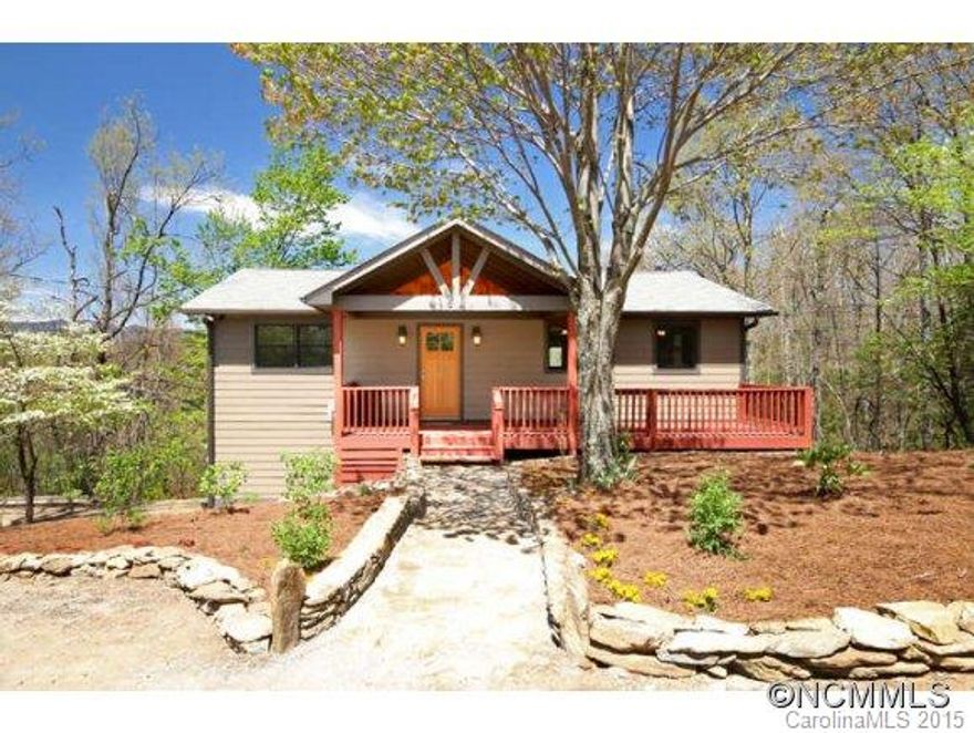 Price Reduced again! Renovated home with year round mountain views.  Home is like new inside and out. Natural wood finishes throughout with updated kitchen, bathrooms, flooring, lighting, windows, doors, etc...too many features to mention. This private mountain location is approximately 12 minutes to downtown Black Mountain. Make it an enjoyable primary home, second home, or vacation rental. One year home warranty.