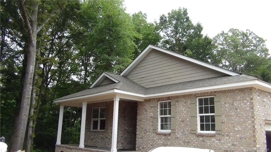 New construction, open floor plan with beautiful hardwood flooring in main living area, spacious master bath,  huge walk-in closet in master.  Large  Tile in all baths, private/wooded back yard with deck.  Rocking chair front porch, stainless appliances, granite countertops.  Convenient location - close to shopping/restaurants.