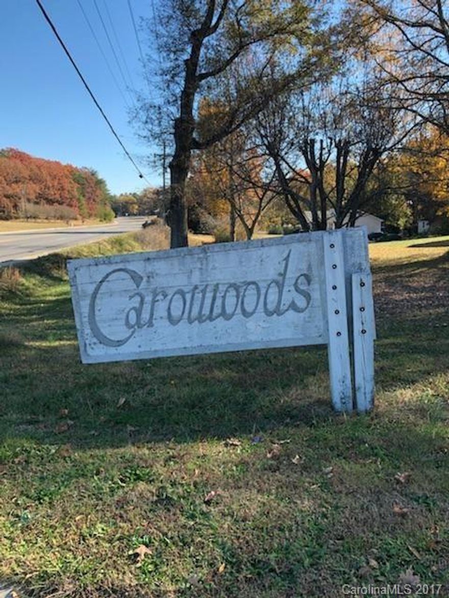 A rare find in Fort Mill! 1.5 Acres in Carowoods in an established neighborhood. It will require a well and septic permit. A beautiful wooded lot to build your dream home!