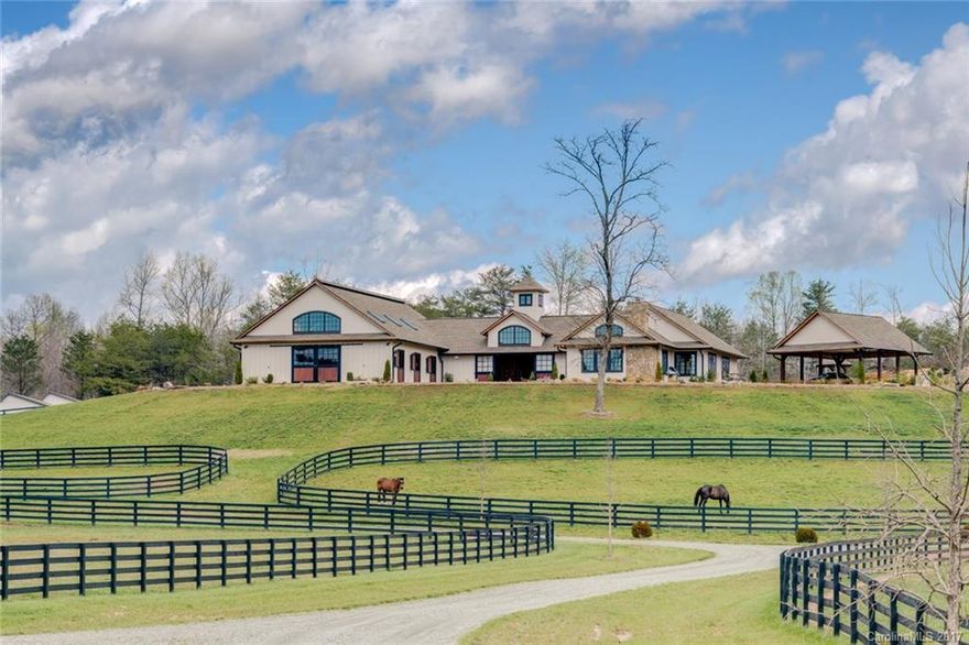 Impeccable Private Estate! Every detail of this property is of the very highest quality. 34 ac. turnkey Equestrian facility includes custom timber frame 6 stall barn, 1,340 sf Hunt Box, 7 paddocks, 4 board fencing, competition size riding arena with custom footing, cross country course, creek and pond. Elegant home with cathedral ceiling great room, stone fireplace, high-end kitchen, master suite, and panoramic mountain views. Deeded CETA Trail access. Close to Tryon Intl. Equestrian Ctr.