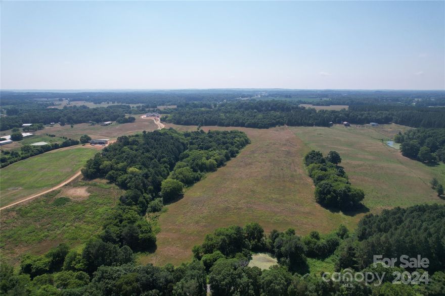 Over 10 acres in Mount Pleasant perc tested for 3 bedrooms and ready to build! Ask your realtor for
access to the soil test, septic drawings and plat map in attachments.