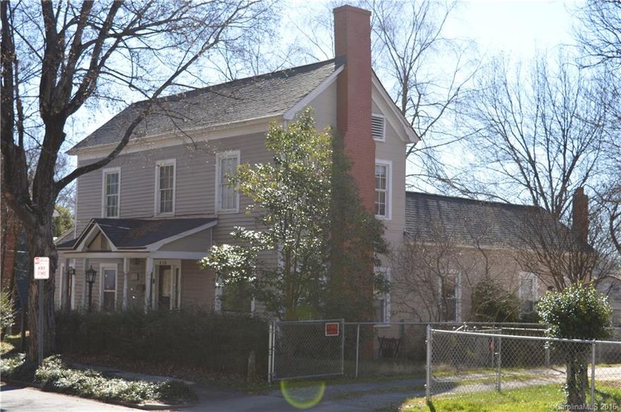 New Roof! Circa 1887 Victorian. Huge kitchen with large center island leads to glass enclosed side porch overlooking sun deck.  The very private yard features goldfish pond, patio, natural areas and a spacious deck with pavilion. Master suite on main level with large 6x9 walk thru closet/dressing area and its own full bath. Formal dining room, 3 full bathrooms. While it went through an extensive renovation 20 years ago, it's time to spruce it back up with a little TLC and mostly paint