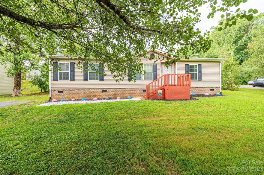 Located on a level corner lot, this 3 bedroom/2 bath home has had a facelift and is ready for a new owner. The front porch and back deck are freshly painted, exterior pressure washed, new carpet in the living room and master bedroom, and the living area walls have just been painted with neutral colors throughout the home. Living room leads to open dining area and kitchen with laundry room located just off the kitchen. There is great closet space in all the bedrooms. Spacious primary bedroom and bathroom featuring double sink, walk-in shower and garden tub. All appliances will remain including the washer and dryer!