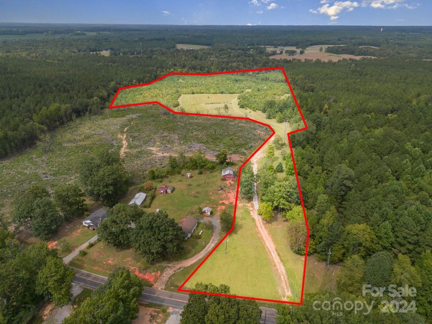 Gorgeous opportunity to own Land ready for your Dream Home and Farm. ~40.75 Acres Pond, Underground power, Water, Septic, Cleared roads, Creek and Fabulous views in desirable Lancaster county, Buford school district. Approximately 8-acres already cleared offering multiple build sites with county water, electrical transformer on site with underground power lines and 3-bed septic system. Homesite cleared has stunning long range views. Approximately 32-acres of Hardwoods, Oak & Pine with abundant wildlife like Turkey and Deer. Enjoy Farm lifestyle with thriving Blueberry and grape bushes. Endless possibilities for recreation, micro-farming and agriculture. Pond is close to homesite & North Prong Camp Creek at back of property. 
Road system can be seen in aerial photos. Seller is open to selling additional land bordering property if desired. 
GPS to "3441 Thompson Rd. Lancaster, SC" will direct you to property entrance.