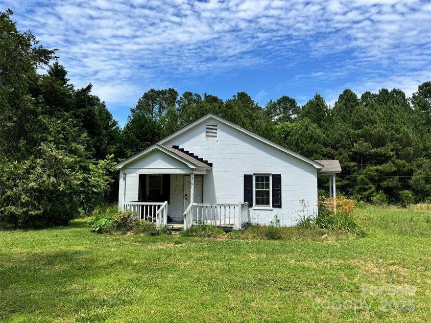 This 2-bedroom home sits on a spacious 1.59-acre lot in a peaceful, rural setting—perfect for someone looking to get away from it all. Features include a covered front porch, a back deck, and plenty of land to make your own.  Sold As Is—Cash Only.