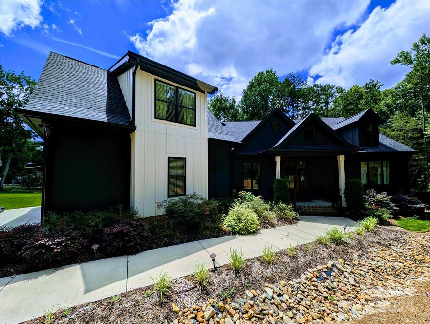 Welcome home to this BEAUTIFUL waterfront home on OVER 1 acre! This home features 3 bedrooms on the main floor with a split BR floorplan. A beautiful kitchen and dining room flow wonderfully into the living room with vaulted ceilings and plenty of space for the whole family. Upstairs find another bedroom/bonus room with a full bathroom, walk-in closet and walk-in attic space with its own HVAC system. The rear of this home is perfect for entertaining year round on the custom screened-in porch and deck overlooking beautiful Lake Wylie. Home features an encapsulated crawlspace, water treatment system, tankless hot water heater, Rain Bird irrigation system and much more. Come see this awesome home today!