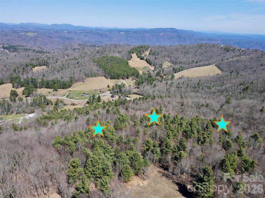 Discover an exceptional opportunity to own approximately 14 acres in a highly desirable High Country location near Boone and Blowing Rock. This magnificent tract offers outstanding long-range view potential with tree control, along with beautiful natural features including creek frontage, rock outcroppings, and native trees. With elevations reaching up to 3,800 feet, enjoy cooler summer temperatures and a peaceful mountain setting. Just minutes from the Blue Ridge Parkway, this property is well suited for a private estate, vacation retreat, or small buildout. The land offers a blend of flat and gently sloping topography, with more sloping areas for tree control and privacy, creating excellent building flexibility with room for multiple homesites. The property is ideal for three potential homesites if a more private layout is desired, though the possibilities are not limited to three sites. With acreage for recreation, hiking, and hunting, this tract also lends itself well to a multi-generational mountain retreat. The property is accessed by a 45-foot-wide easement off Grandview Drive and adjoins common area owned by Blue Ridge Mountain Club. Conveniently located just 7 miles from both Boone and Blowing Rock, you’ll enjoy easy access to shopping, dining, golf, tennis, hiking, biking, equestrian activities, and more. Acreage is estimated, actual acreage amount may be slightly more or less as the property is being divided from a larger 27.69-acre parcel. A survey will be completed prior to closing. Additional acreage is available under listings: MLS 253105 (27.69 acres), MLS 260746 (4~ acres), MLS 260748 (9.69~ acres). Come see this exceptional property today, the High Country is calling!