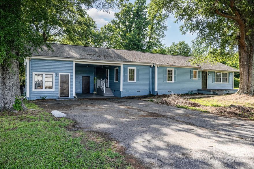 Welcome to 875 Mary’s Grove Road in Cherryville! A MUST SEE!

Located in a USDA-eligible area—potential for $0 down financing (subject to lender approval).
This ranch-style home is situated on just under half an acre and features a functional layout with two separate living areas and an open-concept kitchen, offering ample space for everyday living and entertaining.

Enjoy outdoor living with a screened-in porch and attached deck, ideal for relaxing or hosting gatherings. The detached workshop with a private entrance provides excellent potential for a home office, hobby space, or additional storage.

Recent updates include a new septic system, newer HVAC, and a newer water heater. With no HOA, you’ll have more flexibility in how you use and enjoy your property.

A versatile home with great potential—schedule your showing today!
Get up to $2,500 in closing cost credit when using the preferred lender.