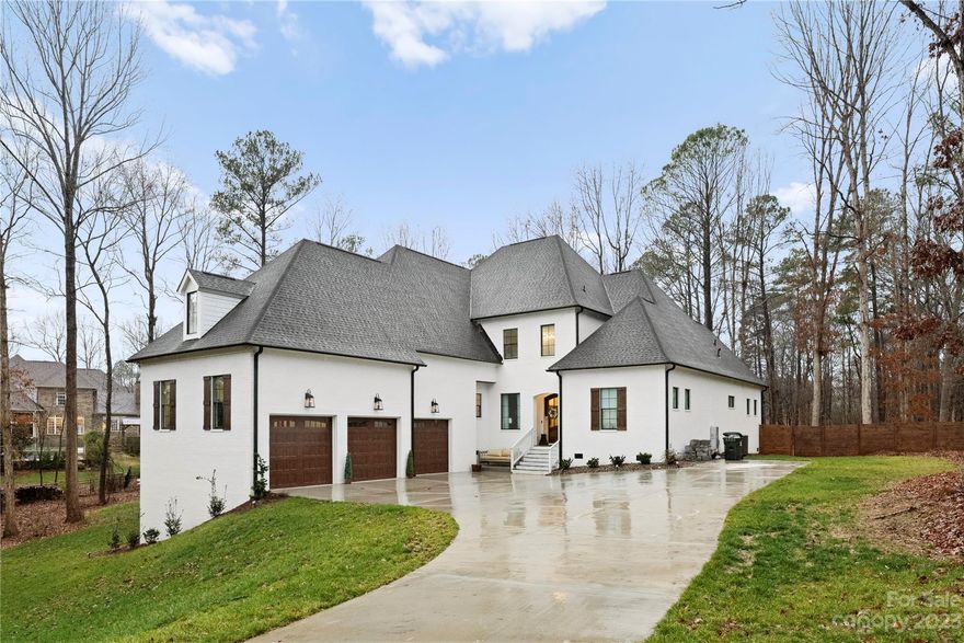 Welcome to this exquisite French Provincial masterpiece nestled on a picturesque lot within the esteemed Carolina Coves neighborhood. This custom home embodies luxury with its rich array of high-end finishes, showcasing an unparalleled level of sophistication. Step inside and immerse yourself in the open floor plan adorned with meticulous detailing at every turn! The main level boasts a generously sized master suite and an additional secondary bedroom, thoughtfully complemented by an inviting open-concept gourmet kitchen. Entertaining is a delight in the expansive dining area and welcoming great room featuring a fireplace—perfect spaces designed for gatherings and relaxation. Ascend upstairs to discover two elegantly appointed bedrooms along with a generously proportioned bonus room, each exuding refined charm and comfort. Step outside to revel in the serene ambiance of the meticulously landscaped yard, offering an ideal backdrop for moments of tranquility and outdoor enjoyment.