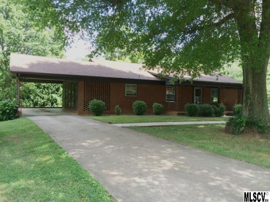 This home is priced to sell and is 3 bedroom, 2.5 bath. Main level consists of a formal living room, den, kitchen, and dining area. With nice large trees you can enjoy the front covered porch or screened-in porch which is off the single carport. There is a large unfinished basement with a built-in storage room & laundry room with half bath, and single garage in basement. The backyard is private, large, and fenced-in.  Located close to downtown Conover, you are walking distance to shopping & food, and very close to I-40.