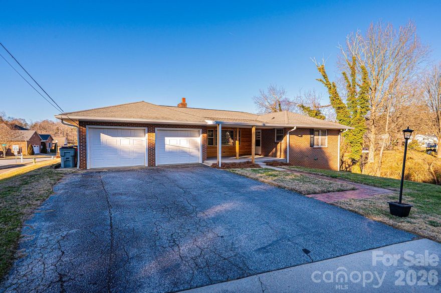 Looking for a single level home in a great location, you really must take a look at this property. Brick ranch with basement, 3 bedroom 2 bath with a double garage.Add a large kitchen area with room to have a causal eating area or den with a fireplace. Separate room for dining or office area and a living room. Make the layout fit your needs the space is there.  A short walk from your front door to the Lenoir Greenway, great way to spend some time outdoors and help get your heart pumping. Also just 5 minute drive from Shopping, Restaurants,Bo's Entertainment Center, Churches and Schools. Easy connection to Hwy 321 if you want to take a drive to Blowing Rock, or maybe catch a football game at App State. Just don't miss your chance call today to see this home.