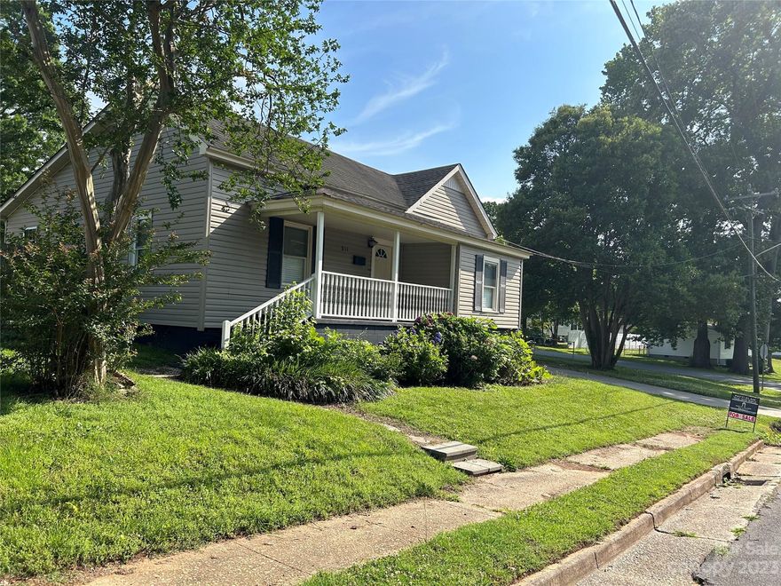 Amazing opportunity to own this corner lot, fenced backyard, home has 3 bedrooms and 2 baths. It has a wired workshop/shed and an additional shed. Close proximity to downtown, restaurants, Harris Street Park, Walter Elisha Park and Strawberry Festival, and much more.  Great schools! Home has had some renovations but could use some of your final touches!  Awesome location in downtown Fort Mill. Bring offers! Sellers believe 1224 square feet being measured.  Don't miss living in this ideal location.