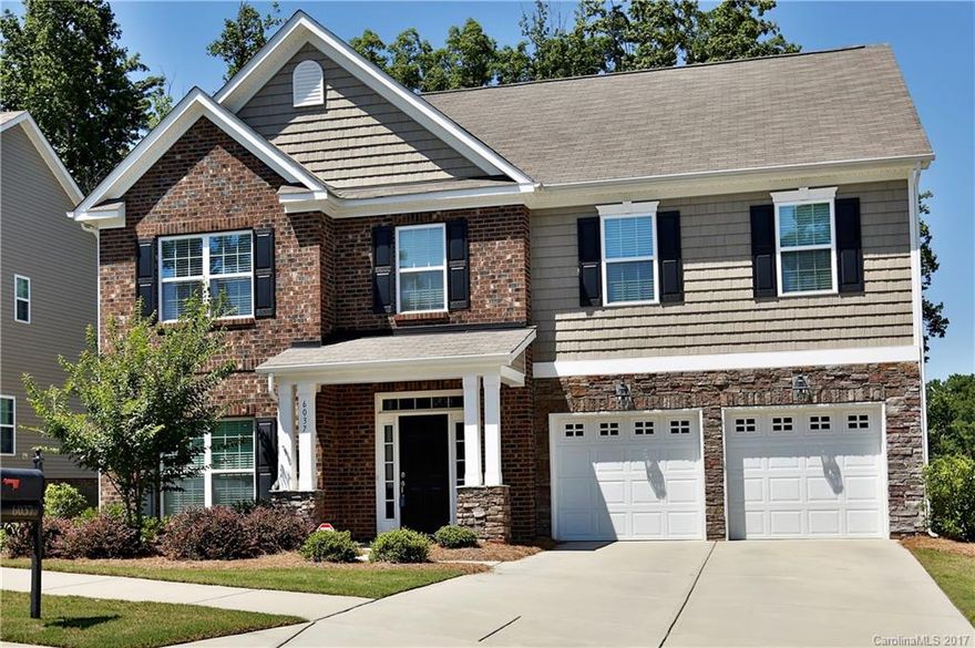 Stowe Pointe 5 bedrooms 4.5 baths on 3 levels! Kitchen has great island, ss appliances, custom tile backsplash, & granite counters!Hardwood floors cover main level, greatroom w/gas log fireplace, office & formal dining room. Custom light fixtures & ceiling fans added. 2 owner level suites on 2nd.  3rd level has 5th bedroom, full bath & bonus room. Backyard paradise is level, backs to woods for privacy & has aluminum no maintenance fence. 2 car garage plus level double driveway!Community Pool!