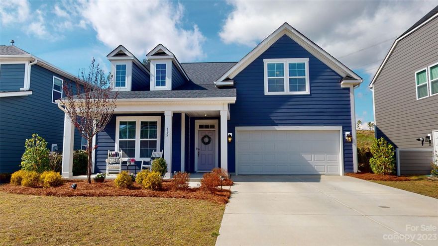 $10,000 Price improvement. $5000 in closing costs if closed before 7/12/23. This house has wow factor; versatile open floorpan w 3 bedrooms down including primary, multiple living spaces, front & back porches, and an entertainers kitchen. Built in 2021, this move-in ready 4 bed, 3 full bath home enjoys a split bedroom plan, laundry room and built-in reading nook or pet palace on the main level. Vaulted ceilings, natural light, gas log fireplace provide a welcoming great room. Gourmet kitchen includes white shaker cabinets, navy furniture island, quartz countertops, farmhouse sink, pull-out bins, glass pantry door. All baths have tiled floors & counter height vanities. Owners en suite has 3 closets, tiled, semi-frameless shower w/ bench. Upstairs has 4th bed, 3rd bath & bonus room. Amenities include 2 pools, playground, trails, and access to the 32 acre Field Day Park. SS Fridge conveys. Award winning Clover District. Low SC taxes. Back on market-no fault of sellers. Call today to view.