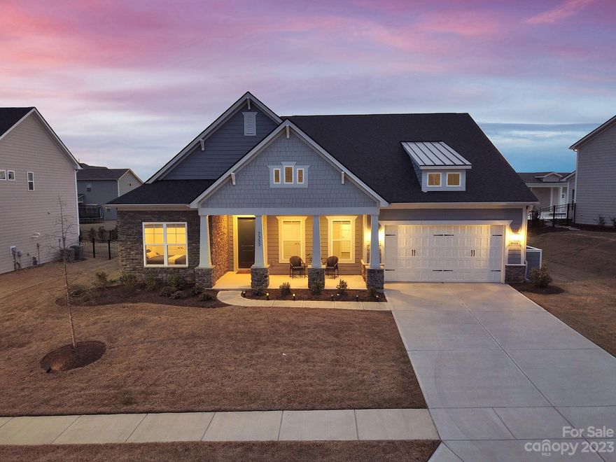 Better than new ranch home in sought after Bent Creek community in Indian Land! Resort-style pool and clubhouse with state-of-the-art fitness center and playground. The Davenport model by Jones Homes, features high ceilings, an open floor plan, dining room, large living room, and a huge chef's kitchen with large quartz top center island, gourmet cabinets, gas range, wall oven, stainless steel appliances, pantry, and oversized breakfast nook. The large owner's retreat features a huge walk in closet, connected laundry room w/ sink, & spa like ensuite bathroom with dual vanities and an extra large tiled shower. Three additional bedrooms share access to two full baths.Many upgrades including heat blocking blinds, Kitchenaid appliances. Enjoy outdoor entertaining in the fenced in backyard with 10k worth of privacy trees already planted for you. Plumbing and gas connection already set up for your outdoor kitchen if you want to add one.Still in builder's warranty.