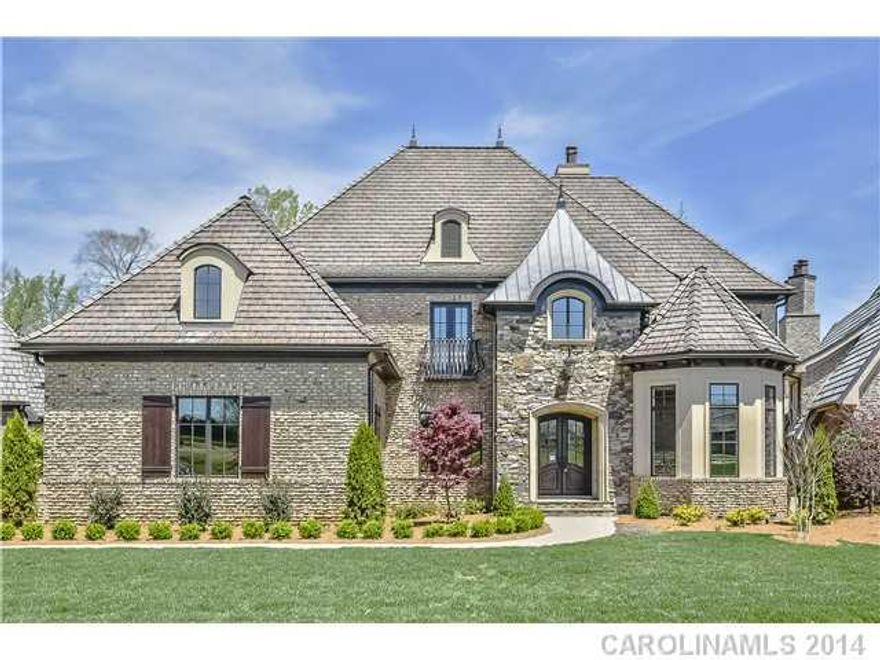 Just Finished April 2014! French Country spectacular w/remarkable views on XL lot nestled in the heart of The Village at Longview! Designed w/conveniences in mind! Beautiful finishes to impress throughout. Wonderful kitchen design w/plenty of cabinetry, Wolf/Subzero appliances, HUGE Pantry w/custom shelving! Elevator, 3-car garages, Master suite on main floor. Hardwoods throughout main floor. 4BRs