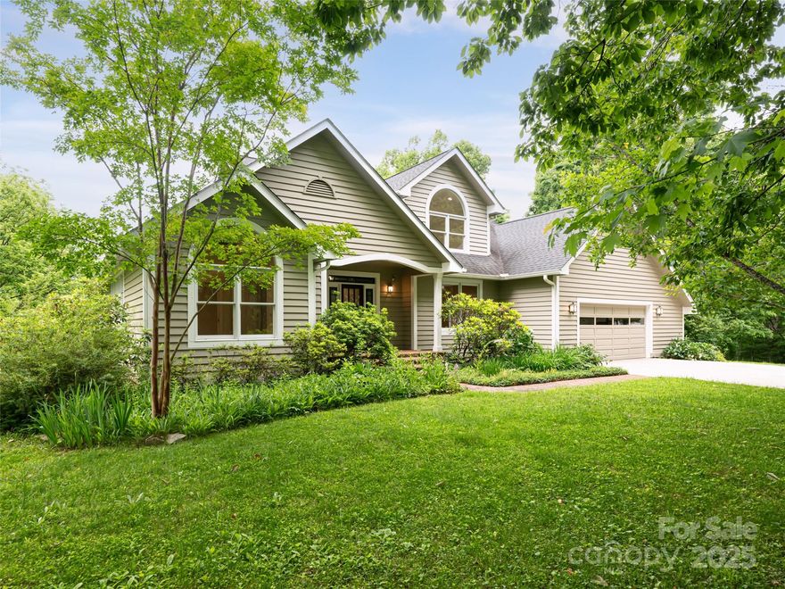 Discover the perfect blend of privacy and breathtaking mountain views in the highly desirable Cane Creek area of Fairview. This exceptional property spans 8.72 acres, comprising three lots, offering you the flexibility to maintain all three for added seclusion or sell one or both for investment opportunities. Nestled in a tranquil community, you’ll enjoy the serene lifestyle of lower-density country living while being just a short drive from vibrant downtown Asheville. One of the standout features of this property is the impressive detached timber frame barn/workshop, showcasing unparalleled craftsmanship.