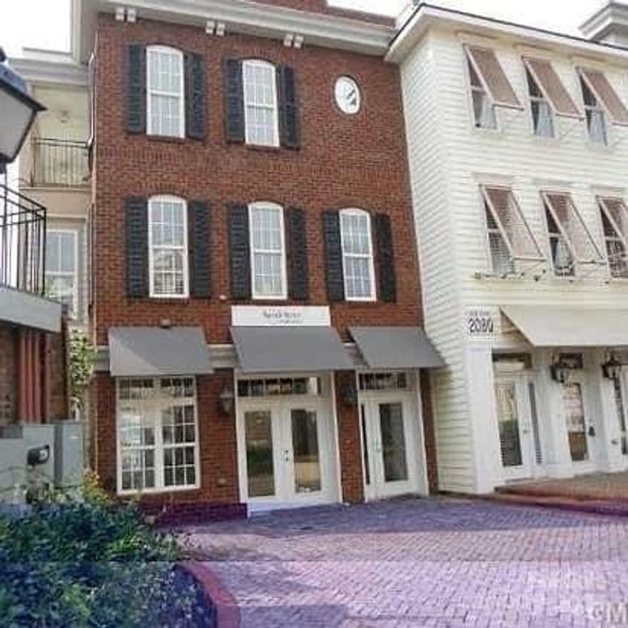 RARE: AYRSLEY LIVE/WORK CONDO/TOWNHOME! Excellent personal opportunity or Income Potential w/Consistent Rentals in Fantastic Ayrsley Location. Shaded & Bricked Courtyard. Beautiful area with walking distance to movie theater, restaurants and breweries! Commercial Unit on main floor Currently Occupied by business.  Upper residential unit currently occupied by tenant. Call agent to set up showing time. Awesome Opportunity! Agent must accompany showing.