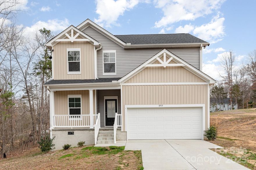 Discover your dream home in this charming 2-story house in Charlotte. This spacious residence boasts 5 bedrooms and 2.5 bathrooms. All bedrooms are on the second level. The main level features a modern kitchen with bar seating, stainless steel appliances, and a cozy breakfast area. Adjacent to the kitchen, you'll find a nice sized living room and formal dining room. This home has a 2-car attached garage and wooden deck at the back. The home sits on a generous lot size.