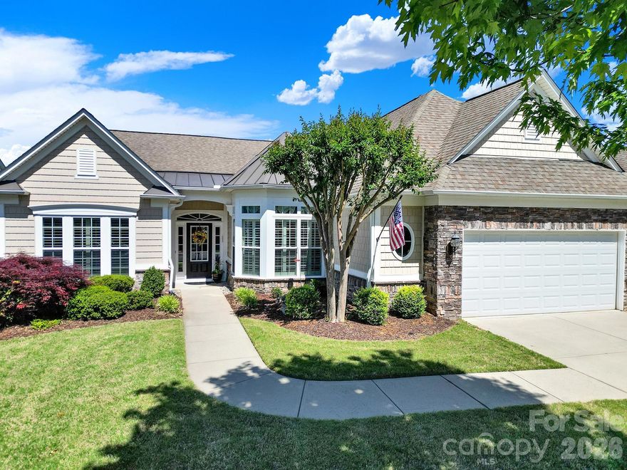 The popular Cumberland Hall model in Sun City Carolina Lakes offers 3 bedrooms and 2.5 baths, blending classic architectural details with modern, open-concept living. Hardwood floors, elegant wainscoting, plantation shutters, and a neutral paint palette create a warm, refined interior.

The welcoming entry leads to a private study with French doors, ideal for a home office or quiet retreat. At the center of the home, the kitchen features a granite island, white cabinetry, a stainless steel wall oven with built-in microwave, and a separate gas cooktop. It opens to a bright breakfast area and flows into a spacious living room with a gas log fireplace, perfect for everyday living and entertaining.

A generously sized laundry room with built-in cabinetry and a utility sink adds convenience, while the 3-season sunroom offers a comfortable space to relax and enjoy the outdoors.

Located in Sun City Carolina Lakes, residents enjoy access to an award-winning active adult lifestyle with over 135 clubs, scenic lakes, an 18-hole golf course, and resort-style amenities including clubhouses, pools, tennis courts, walking trails, and a dog park.