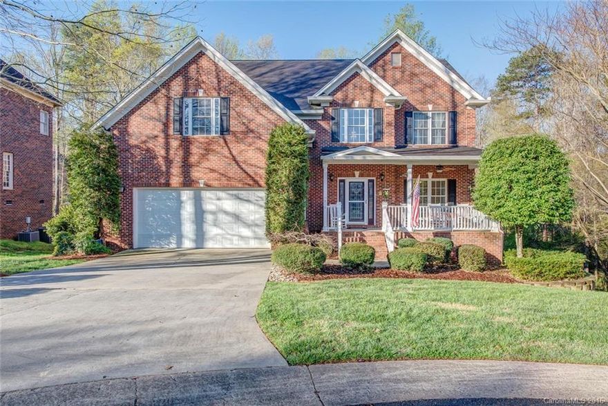 Fabulous home has welcoming front porch overlooking quiet cul-de-sac located in gated community. Grand 2 story entry, wood floors and open concept floor plan. Enjoy one of the fireplaces w/built-ins from kitchen and great room. Entertaining is easy w/large 2 tiered deck and a basement bar/rec room w/fireplace, guest suite on lower level allows for privacy. Workshop or golf cart storage in basement.