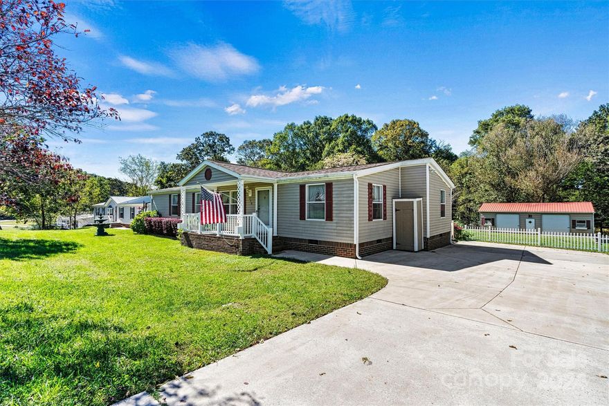 Wonderful spacious 3 bed 2 bath home. Awesome wired 24'X35' detached garage workshop fully equipped w/work bench & shelves & tons of electrical outlets. Fully fenced backyard & oversized covered back deck to entertain friends & family. Large kitchen w/tons of cabinets, & countertops for the top chef in your household. Kitchen opens to dining area & family room w/wood burning fireplace. (gas conversion kit is included). Super private primary bedroom w/walk in closet & en-suite bathroom. Nice size guest bedrooms & guest bathroom. Huge laundry room provides plenty of storage. This home is truly a must see for a growing family w/ pets and a perfect man cave. Just a short drive to free boat launch at ever popular Lake Norman. So bring the jet ski's, kayaks & fishing boats. .5 acre lot provides tons of privacy and extra large large concrete driveway provides plenty of parking & turn around pad.
Brand New Septic Tank Nov. 2024,new HVAC June 2024.