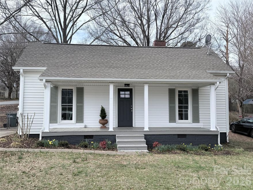 Beautifully and thoughtfully updated home that blends modern updates with classic charm. Step inside this Carftsman-Styled bungalow to find a welcoming foyer, an inviting living space reflecting neutral earthy tones, stylish finishes, and a comfortable layout perfect for relaxing or entertaining. The remodeled kitchen boasts new custom cabinets, stainless steel appliances, and beautiful granite countertops, creating a functional space for cooking and gathering. Both bedrooms are well-sized, offering flexibility for guests, a home office, or a cozy retreat, while the fully restored bathroom showcases classic tilework and fixtures for a clean, polished look. Outside, enjoy the welcoming front porch and easy-to-maintain yard, ideal for morning coffee or weekend downtime. Conveniently located near downtown Concord, shopping, dining, and major roadways and the new massive pharmaceutical facilities, this home offers the perfect mix of comfort, style, and accessibility. Don’t miss your chance to own this move-in-ready gem! Updates include electrical wiring, fixtures, panel and meter box; Updated plumbing and fixtures.