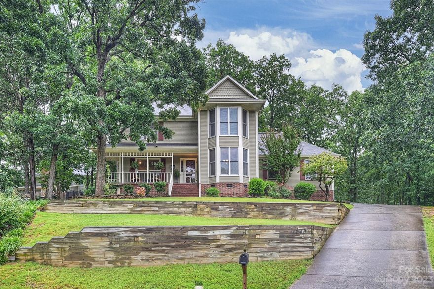 Welcome Home to this charming 3 bed 2 ½ bath home in the wonderful community of Brightmoor in Matthews! Spend time w/loved ones while enjoying the wood burning fireplace in the large family room.  No carpet in the entire house!  An updated kitchen features granite countertops, tile backsplash, and gas range.  The bright dining room features a lovely bay window. Upstairs you will find the huge primary suite, ensuite with dual sinks, stand up shower, garden tub, and large walk-in closet; two spacious secondary bedrooms, and hall bath.  Enjoy relaxing evenings outside on the covered back deck overlooking your huge private flat backyard. Wonderful winding boardwalks throughout the 1/2 acre yard. Custom wired shed with a/c included.  Oversized double car attached garage. Great flat parking for 2/3 more cars at top of driveway.  New HVAC 2021.  Highly desireable Brightmoor has 2 pools, cabanna, tennis courts and greenway trails.  Next to top rated parks. Google fiber!