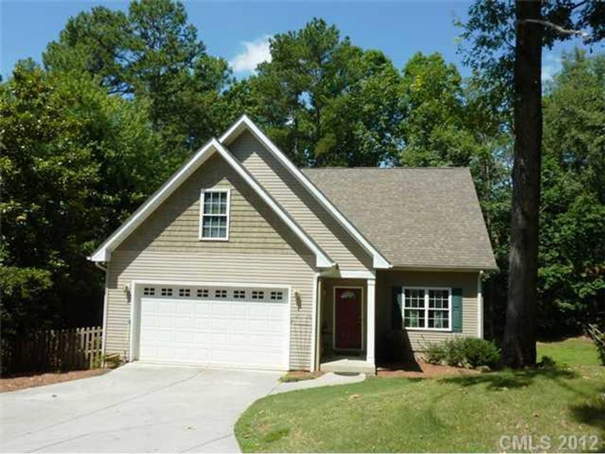 Home has view of golf course.  Kitchen has stainless appliances and solid surface counters, breakfast area.  In law suite on main, master suite covers the entire 2nd level has sitting room/bonus room or nursery/library.   Many upgrades which includes finished basement for 5th BR/billiard room, rec room,office or playrooms. Rear patio. Owner will consider a lease purchase