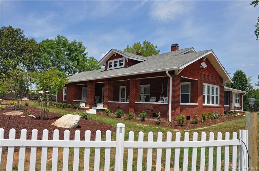 Attention Investors -Turnkey vacation rental on 6 acre mini-farm 12 mins to TIEC. Furnishings est at $50k. Home remodeled from top to bottom. 3 BR and two full baths on 1st floor. Master includes en-suite bath and adjacent nursery/office area. Two rooms upstairs offer additional space. LR w gas fireplace opens to cozy sunroom and full front porch. Eat-in kitchen plus separate laundry/mud room. New custom 4 stall barn and level fenced paddocks. New privacy fencing & great landscaping.