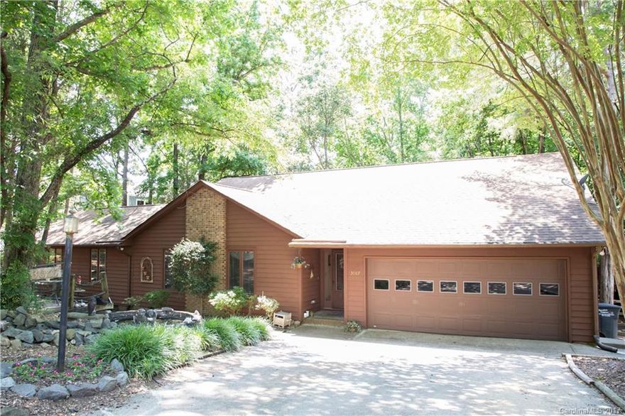 Spacious ranch style home in Historic Tega Cay. 3 bedrooms and a bonus room with bathroom - possible in-law suite or Studio with inter-leading door, has a separate entrance and undercover parking area too. Home surrounded by trees and in a cul de sac off Point Clear main drive. Sought after Tega Cay location with no HOA fees. Tega Cay amenities include a clubhouse, pool, Golf Course, Tennis club, Croquet club, playgrounds, parks, walking paths. Boat slips in area. Marina | beach options too.