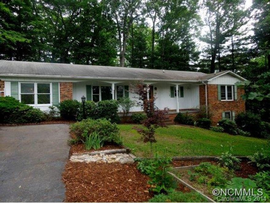 In town convenience w/out the city taxes, beautiful hardwood floors, sun room, mountain views, wood burning fireplace, natural landscaping, new heat pump(2013), dishwasher(2014), and hot water heater(2010); Wonderful home in move-in condition!