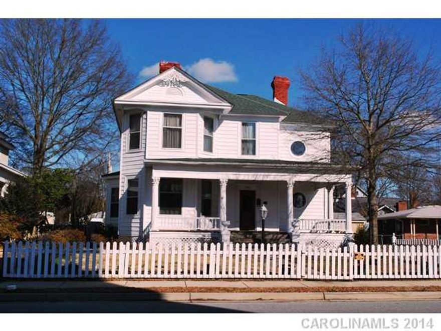 Beautiful Victorian style house in historic downtown Rock Hill.  Hardwood floors throughout. High ceilings. Spacious rooms. Beautiful sunroom. Zoned "neighborhood office". Endless possibilities with this home! Carriage house in back for storage.
