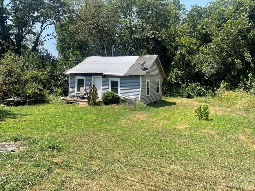 Embrace the luxury of space with this lot that provides ample room for your dreams. Whether you're envisioning a private retreat or an investment property, this lot has the capacity to transform your dreams into reality.  Situated in a tranquil and sought-after location where everything you need is just a stone's throw away, this property offers the perfect blend of natural beauty and developmental potential. Whether you're an investor with a keen eye for opportunity or an individual ready to craft your own haven, this land promises a world of possibilities.  Don't miss this incredible opportunity to secure land in a prime location. 

* Structure on the lot is uninhabitable and would need to be removed by the buyer.