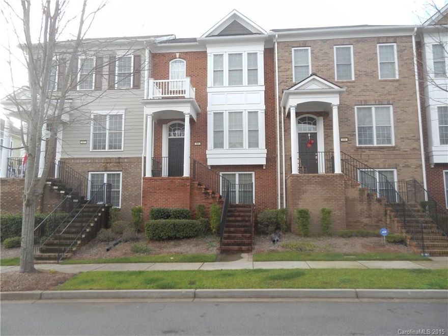 Beautiful 3 story brick front townhouse w/2 car garage in Baxter Village.  Loaded with trim and crown molding and has 9' ceilings.  Kitchen is equipped with upgraded cabinets, SS appliances and granite counter tops.  Living room with gas fireplace and hardwood floors.  Washer/Dryer located on 2nd Floor.  Rental includes amenities at Baxter Village such as pools, tennis, clubhouse and parks.  Walking distance to shops and restaurants.  Conveniently near I77 and I485. A must see home.